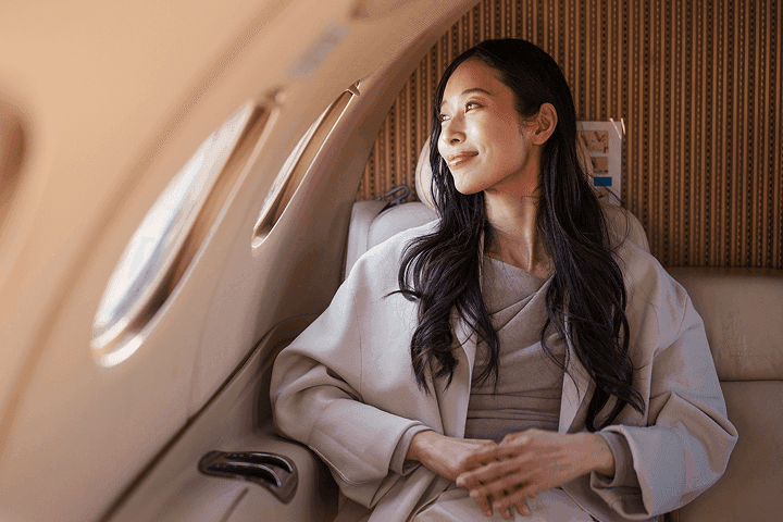 Woman in luxury wellness setting representing high-net-worth insurance advisory